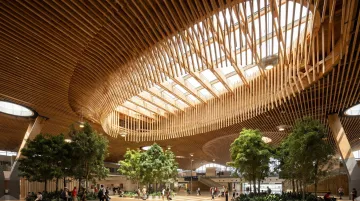 Portland International Airport mass timber roof expansion sustainable terminal interior