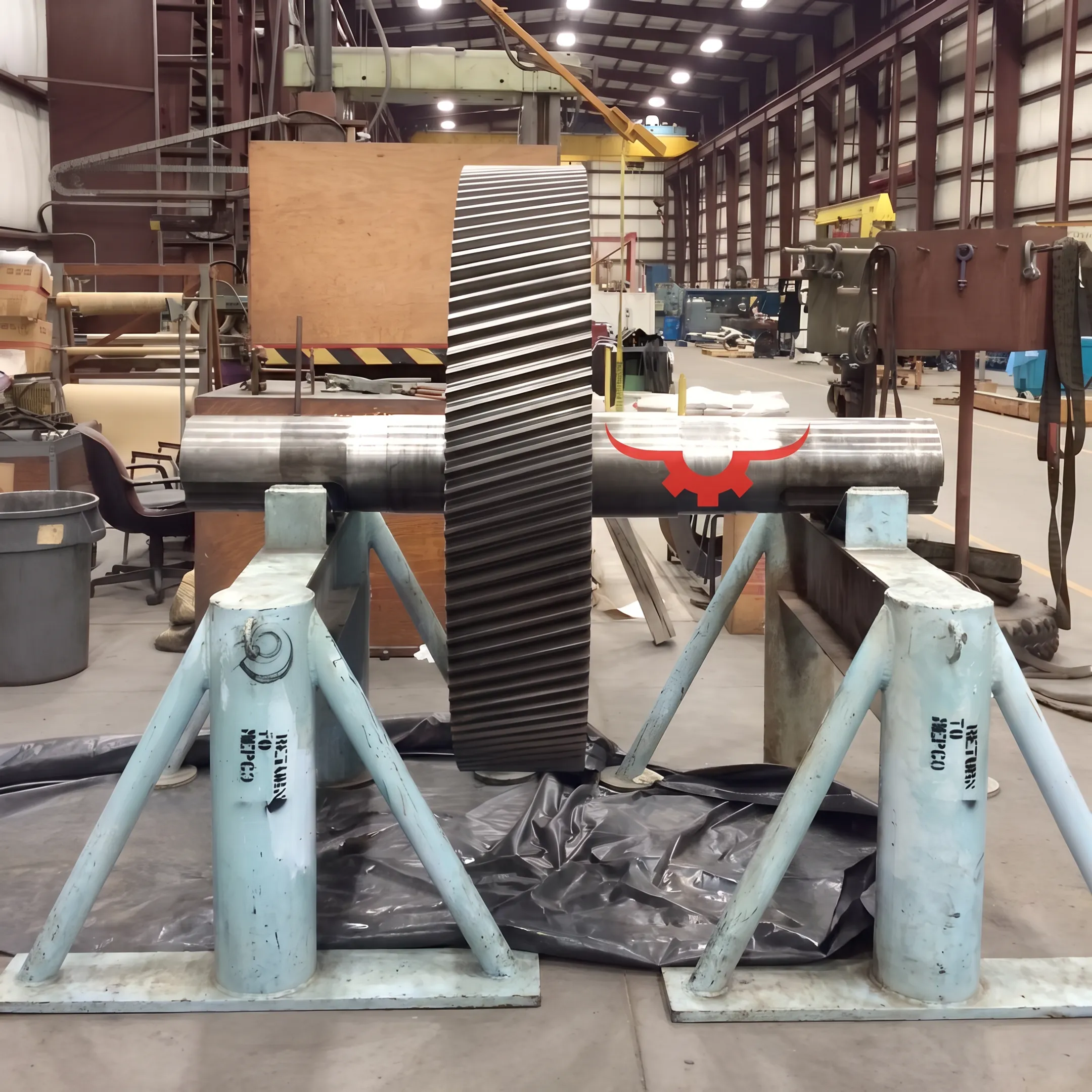Precision-cut involute gear beside industrial machining equipment
