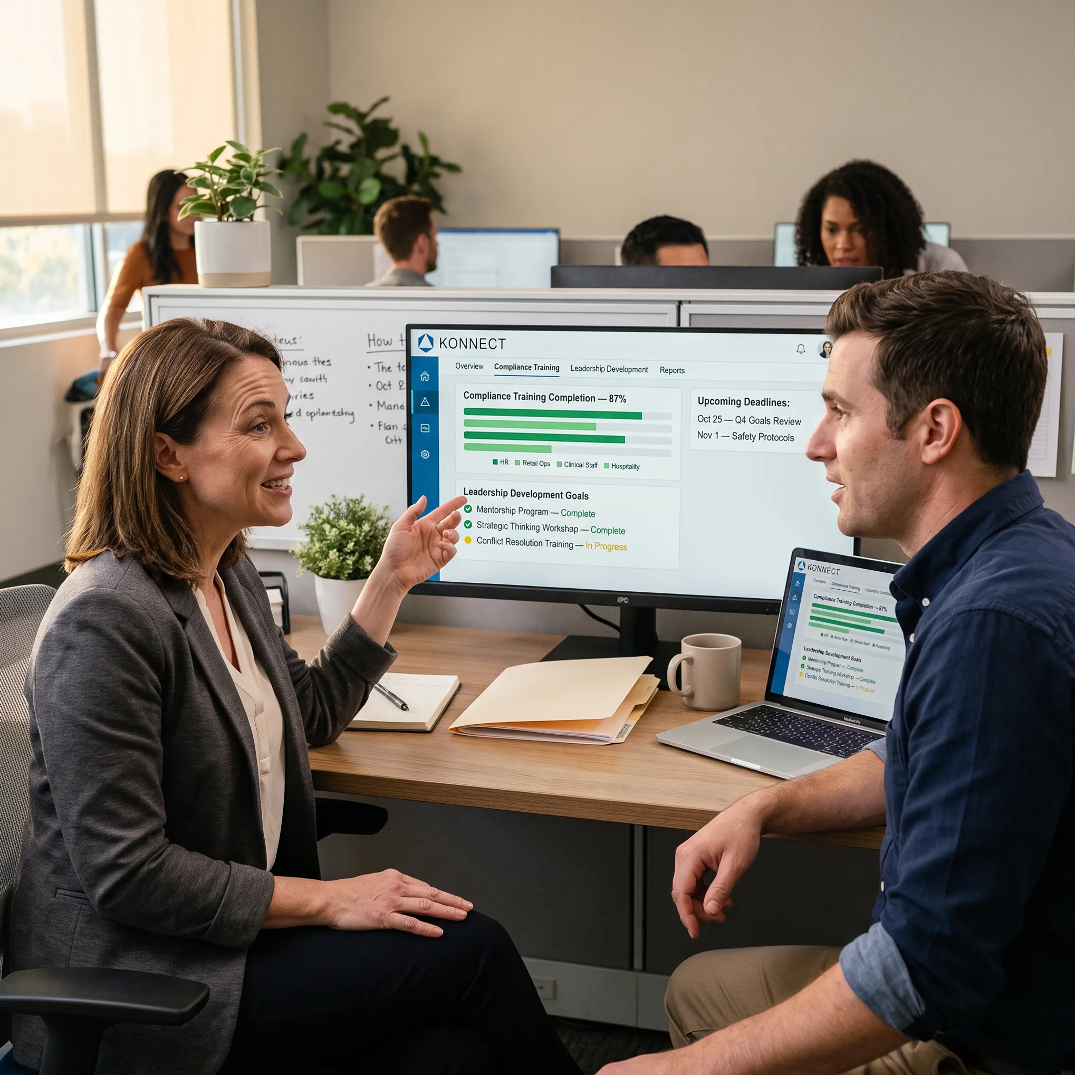 Manager reviewing employee learning progress
