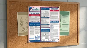 Required federal and state labor law compliance posters displayed at workplace worksite