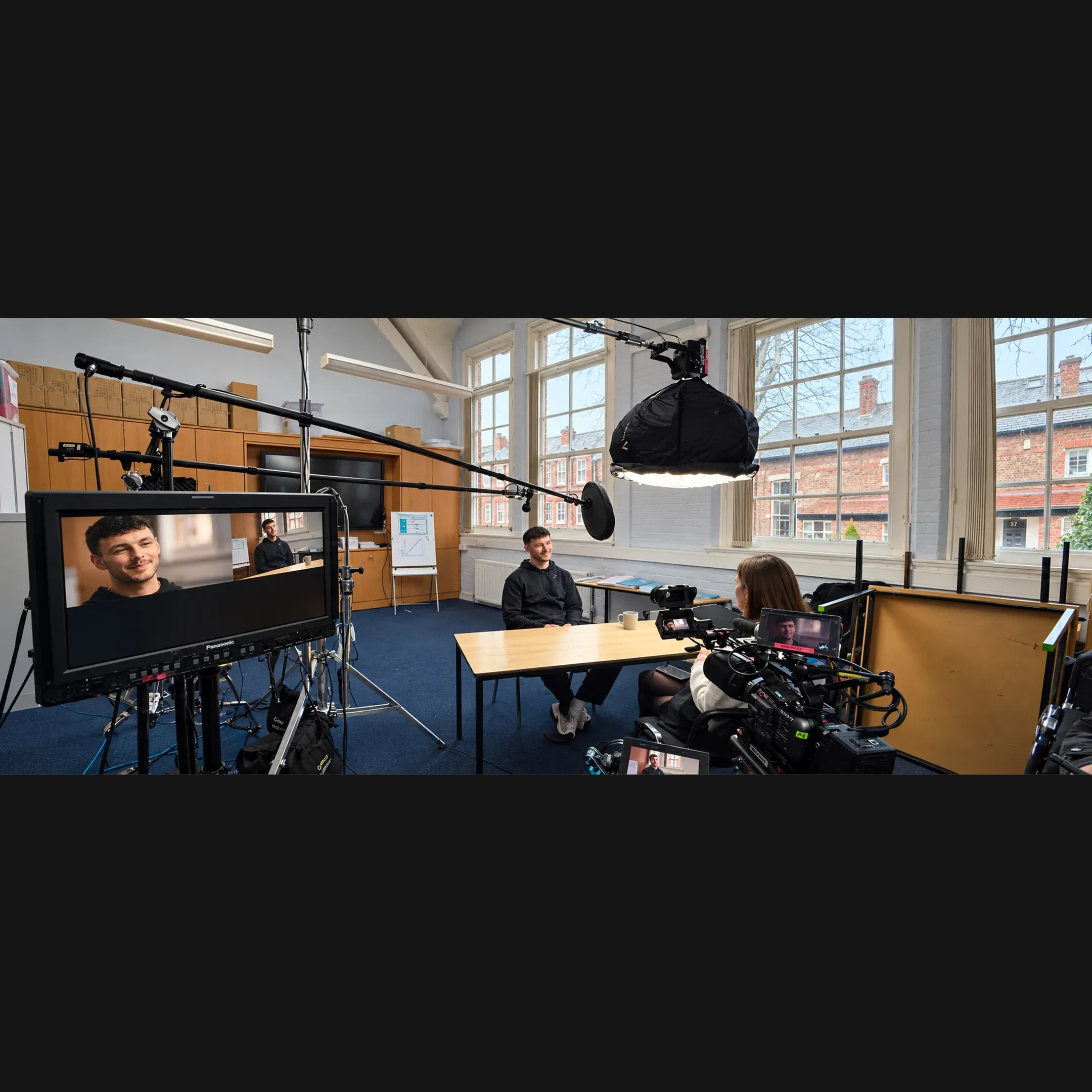 Editor reviewing film footage in studio