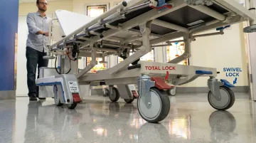 Medical-grade total lock and swivel lock casters on hospital cart and bed equipment