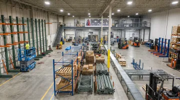 Icon Material Handling warehouse facility displaying pallet racking and conveyor systems
