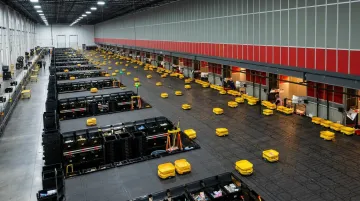 Third-party logistics warehouse with robotic sorting fleet handling multiple brand SKUs