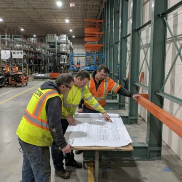 Warehouse crew planning equipment installation