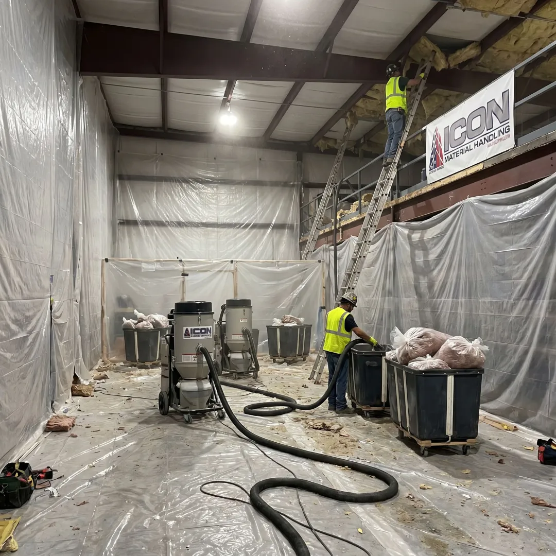 Crew preparing insulation removal work area