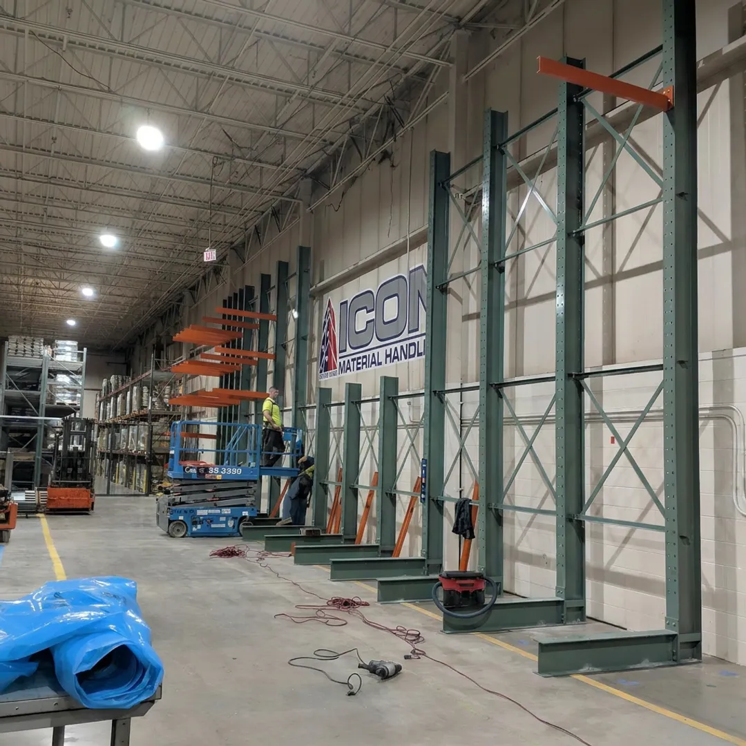 Crew installing industrial pallet racks