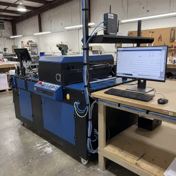 Commercial printer connected to a workstation