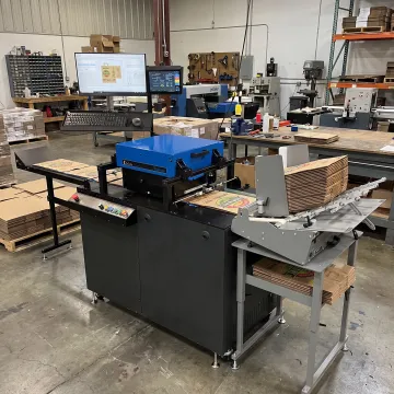 Digital inkjet printer producing custom paper bags