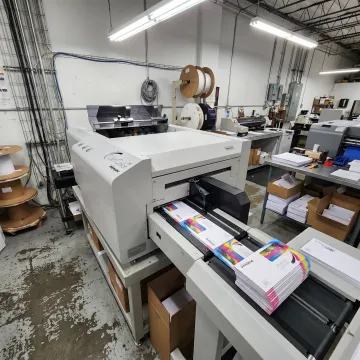 High-speed inkjet printer producing full-color envelopes