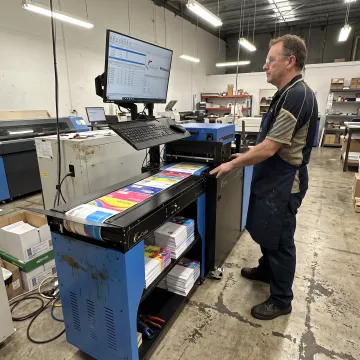Commercial inkjet printer producing full-color envelopes