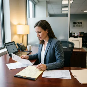 Recruiter reviewing executive assistant candidates