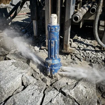 DTH drilling process with hammer bit