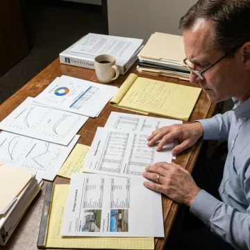 Investor reviewing real estate-backed investment strategy