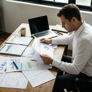 Fund manager reviewing real estate investment portfolio