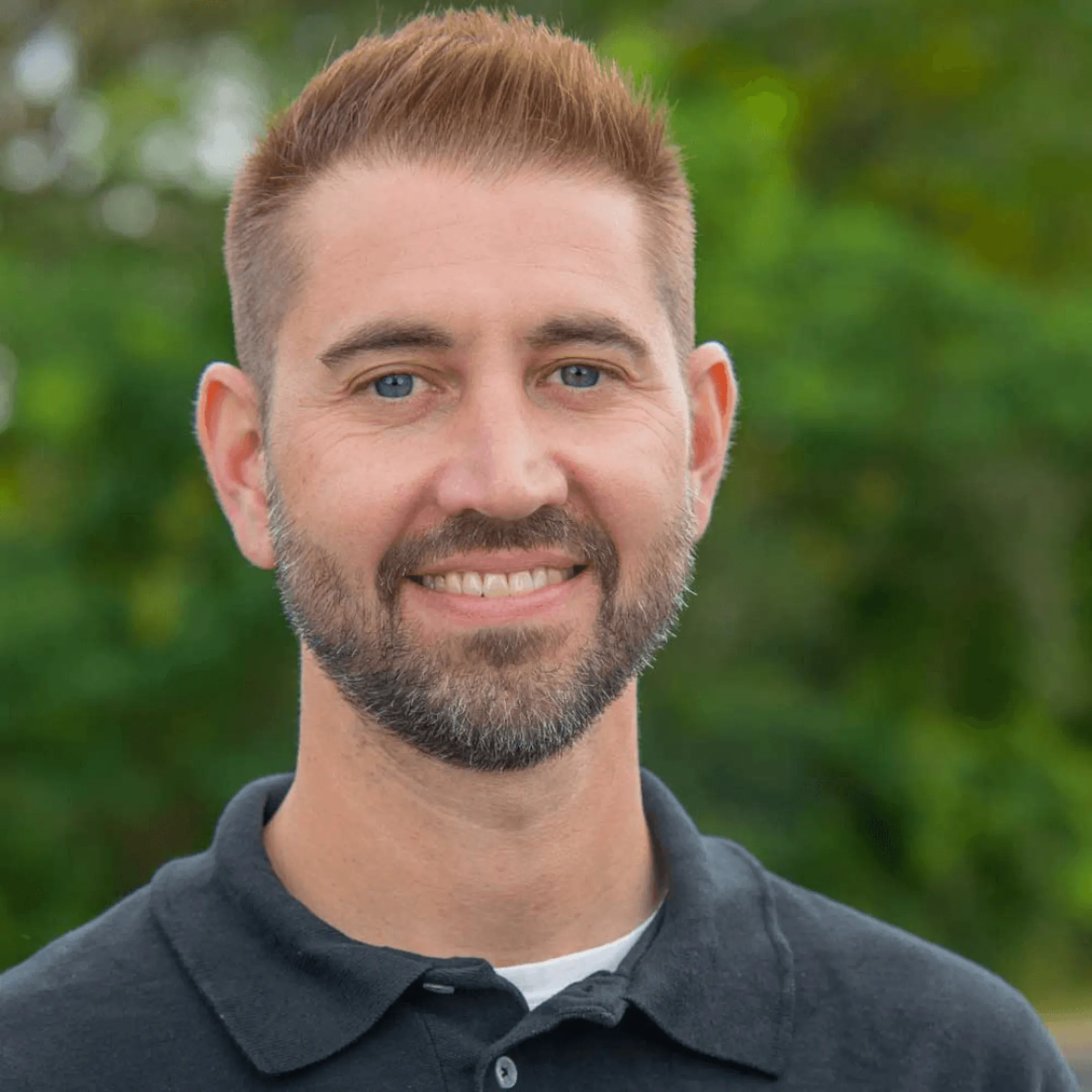 Portrait of Marty Borer, VP of Operations at IP Systems