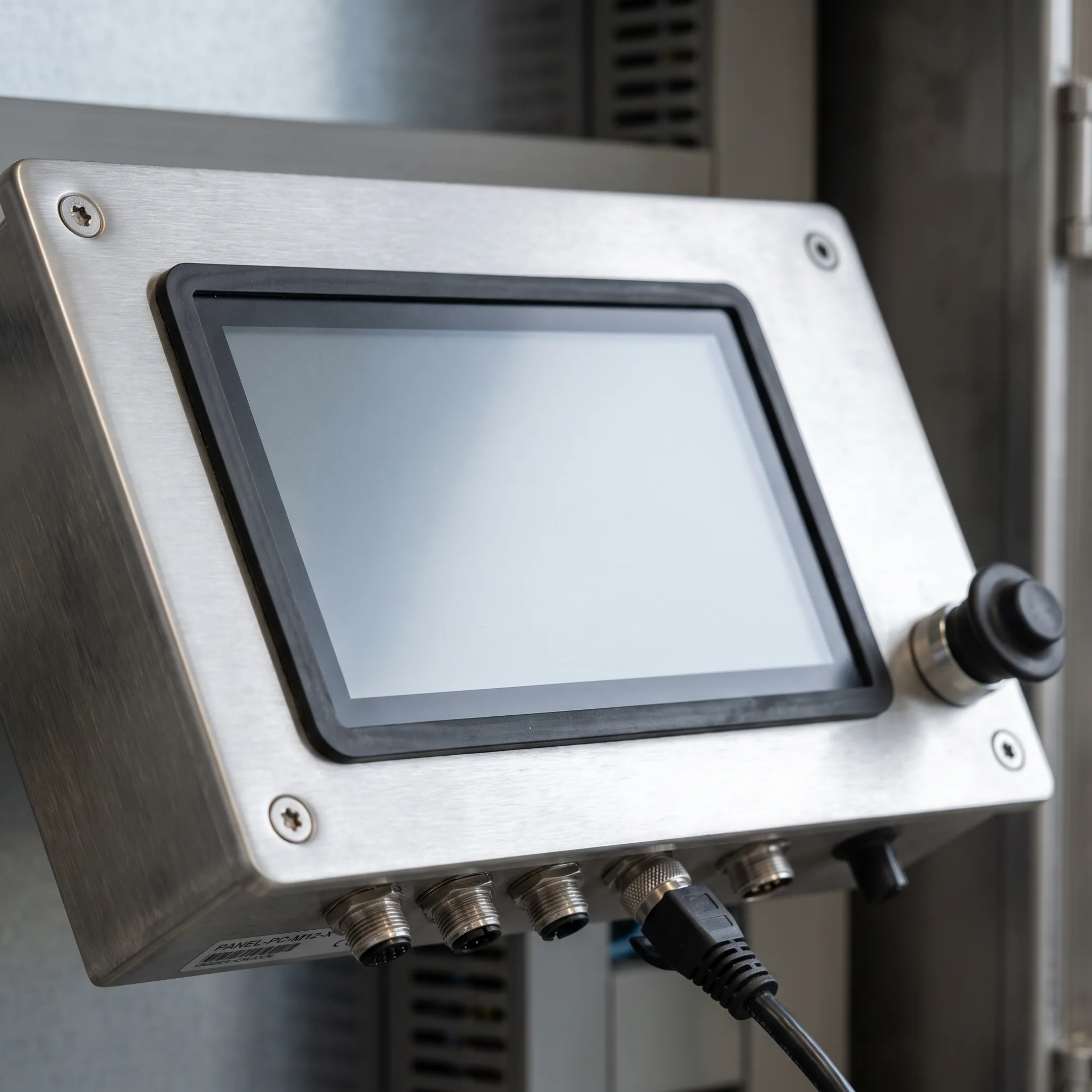 Custom industrial touchscreen display mounted in equipment