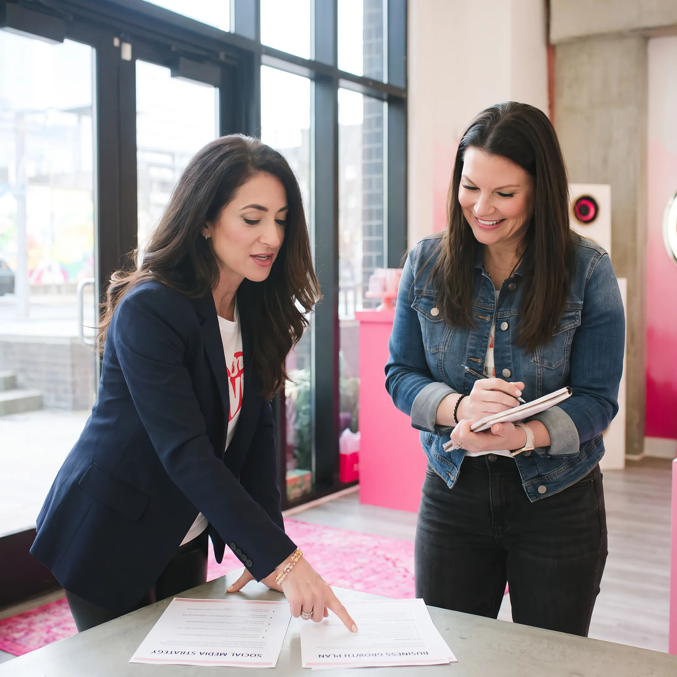 Jacinta Devlin coaching a woman content creator during a strategy session