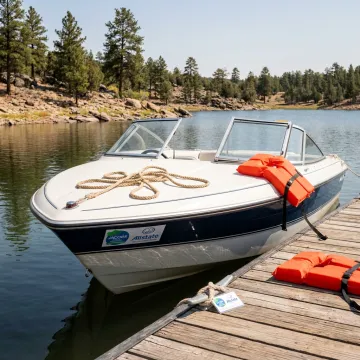 Boat on lake with on-water assistance coverage support