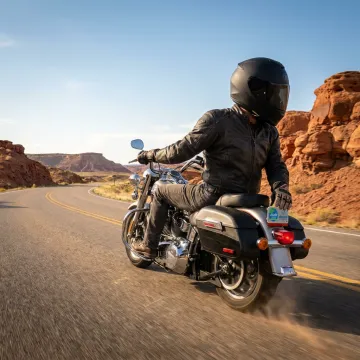 Motorcyclist riding on a New Mexico desert highway