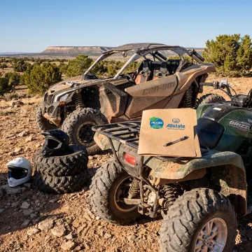 UTV and ATV on rugged trail