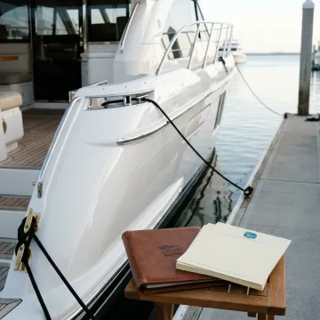 Luxury yacht docked at marina