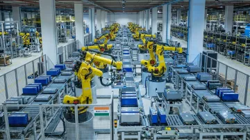 India electric vehicle production facility assembly line showing EV battery pack components