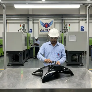Two-wheeler plastic components manufacturing for motorcycles and scooters