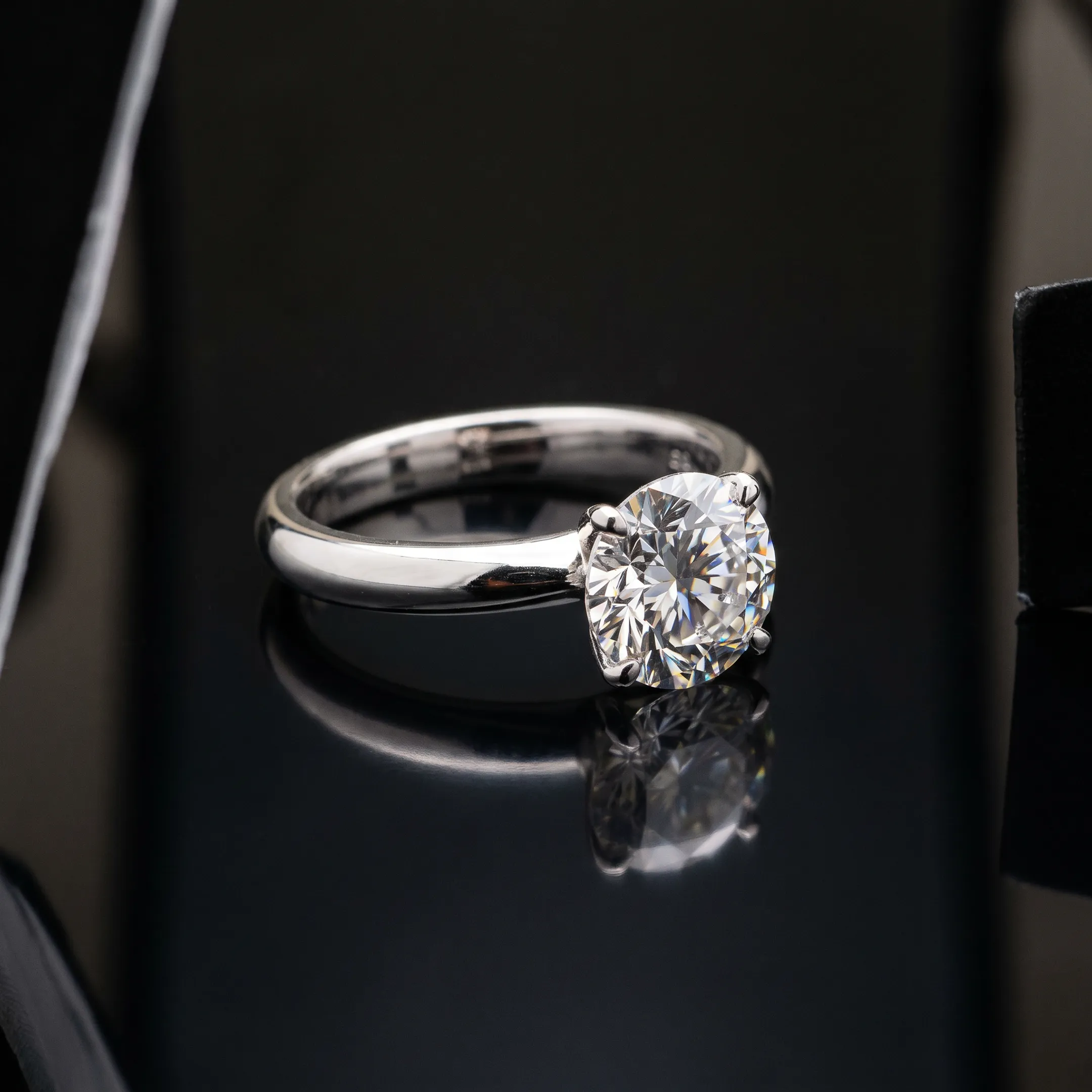 Luxury diamond ring studio photography showcasing intricate details
