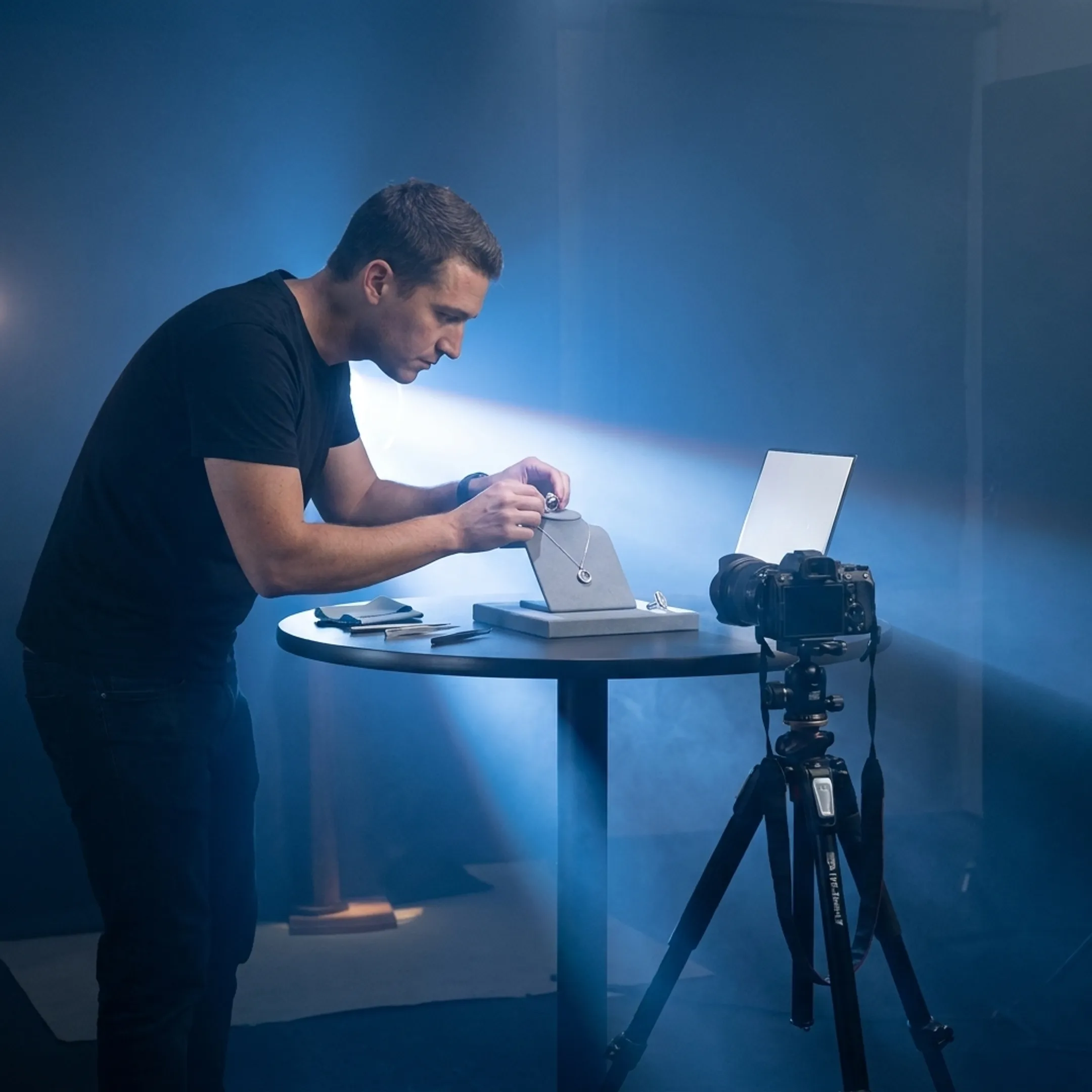 Jewelry being photographed in a professional studio