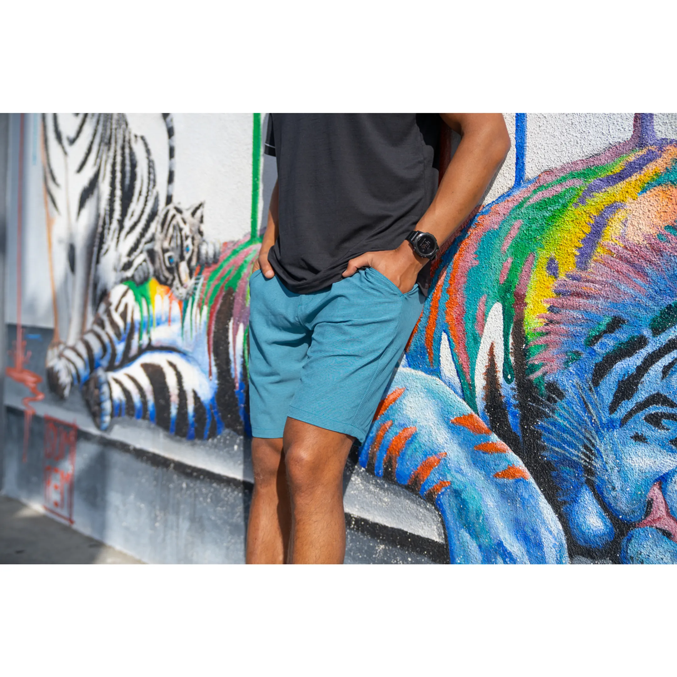 Digital artist using graphics tablet for detailed garment retouching and color balance