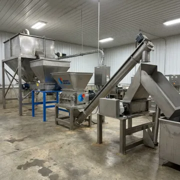 Pet food processing equipment in an industrial production line