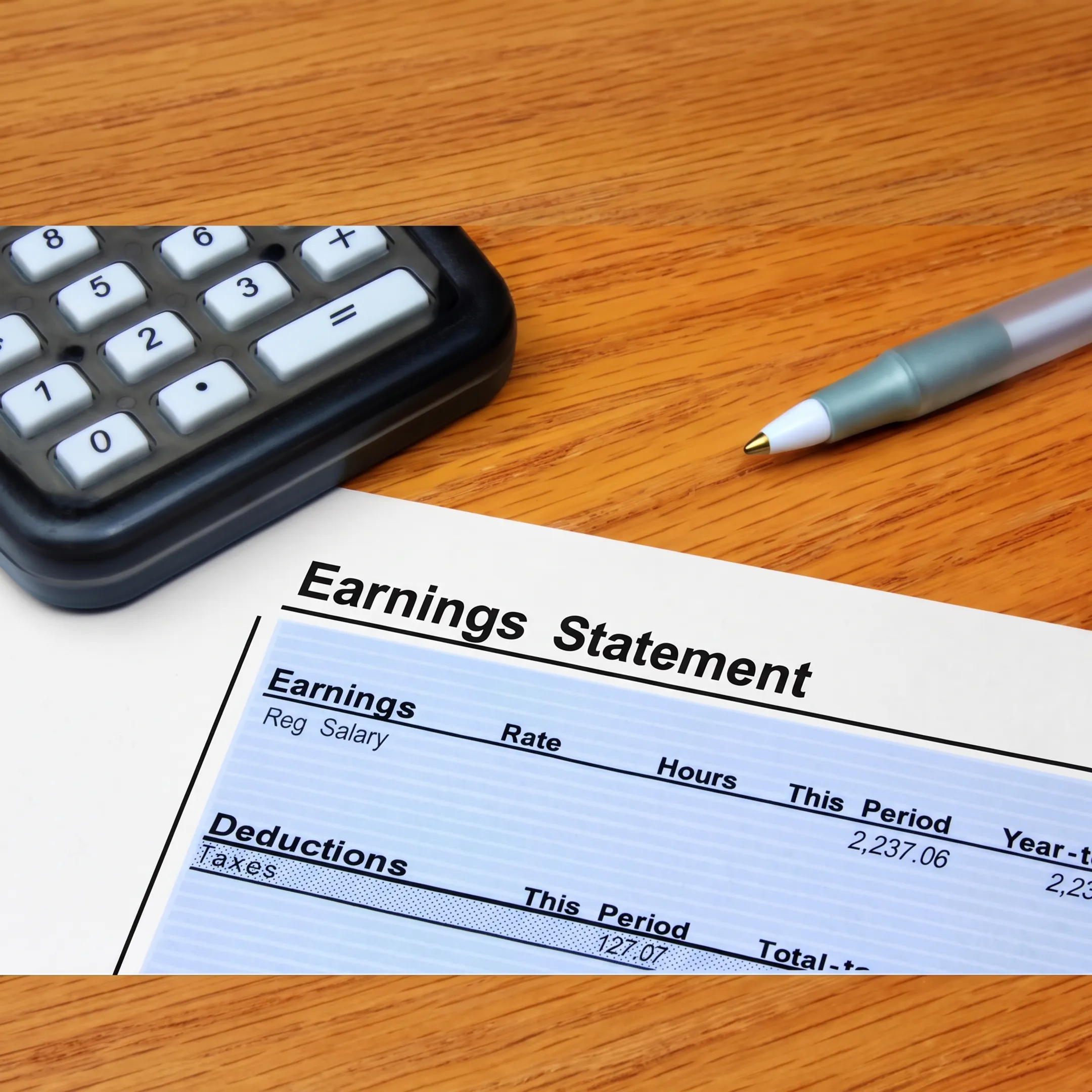Professional preparing state compliance filing paperwork