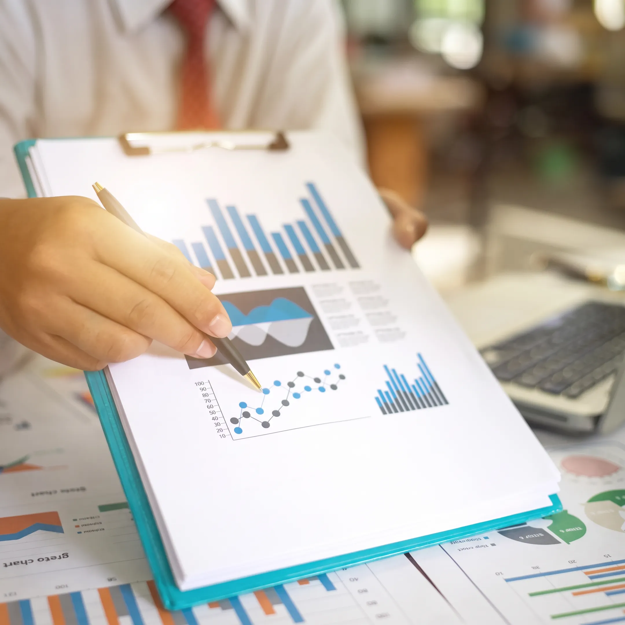 Consultant presenting business growth recommendations using financial reports