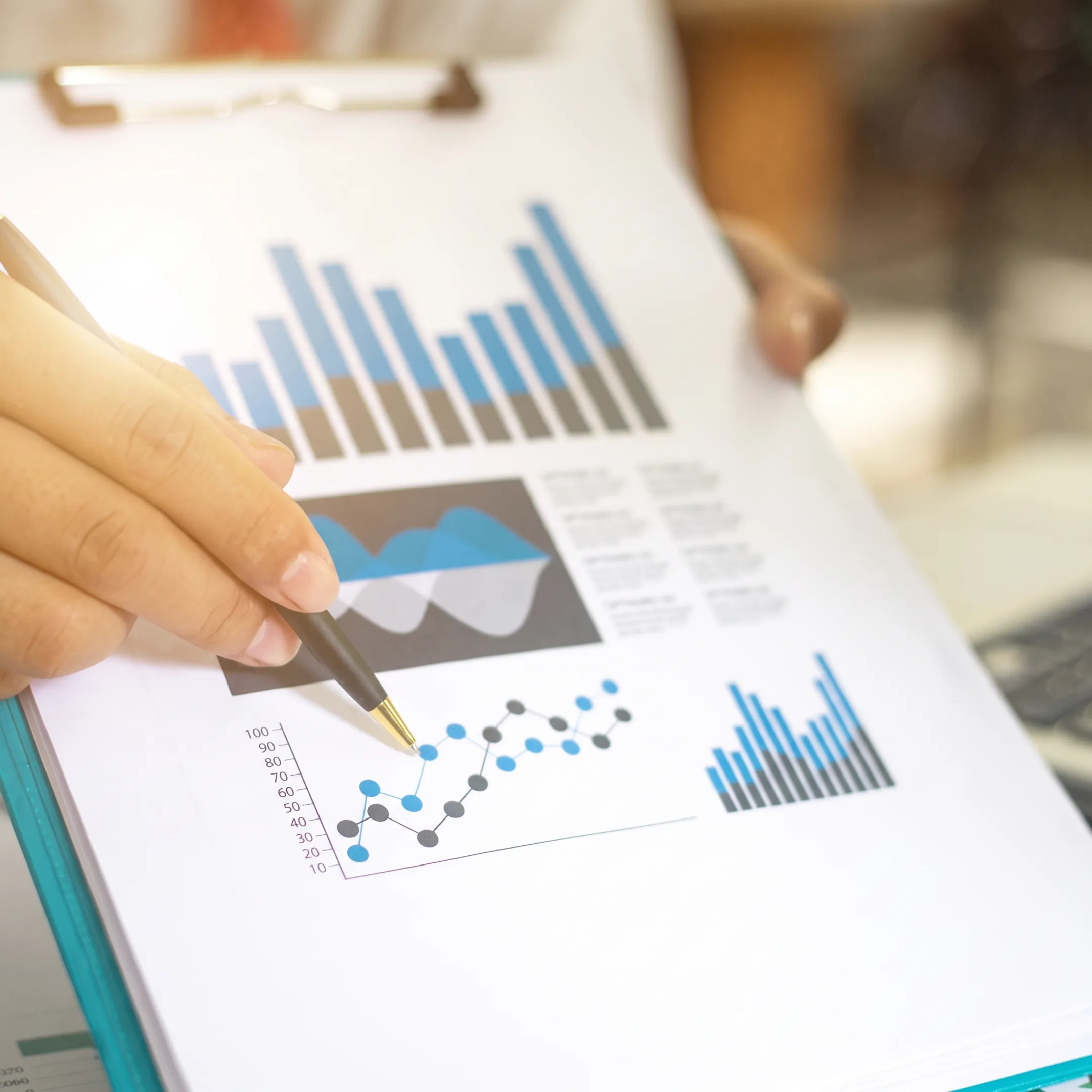 Financial advisor discussing business cash flow planning with an owner