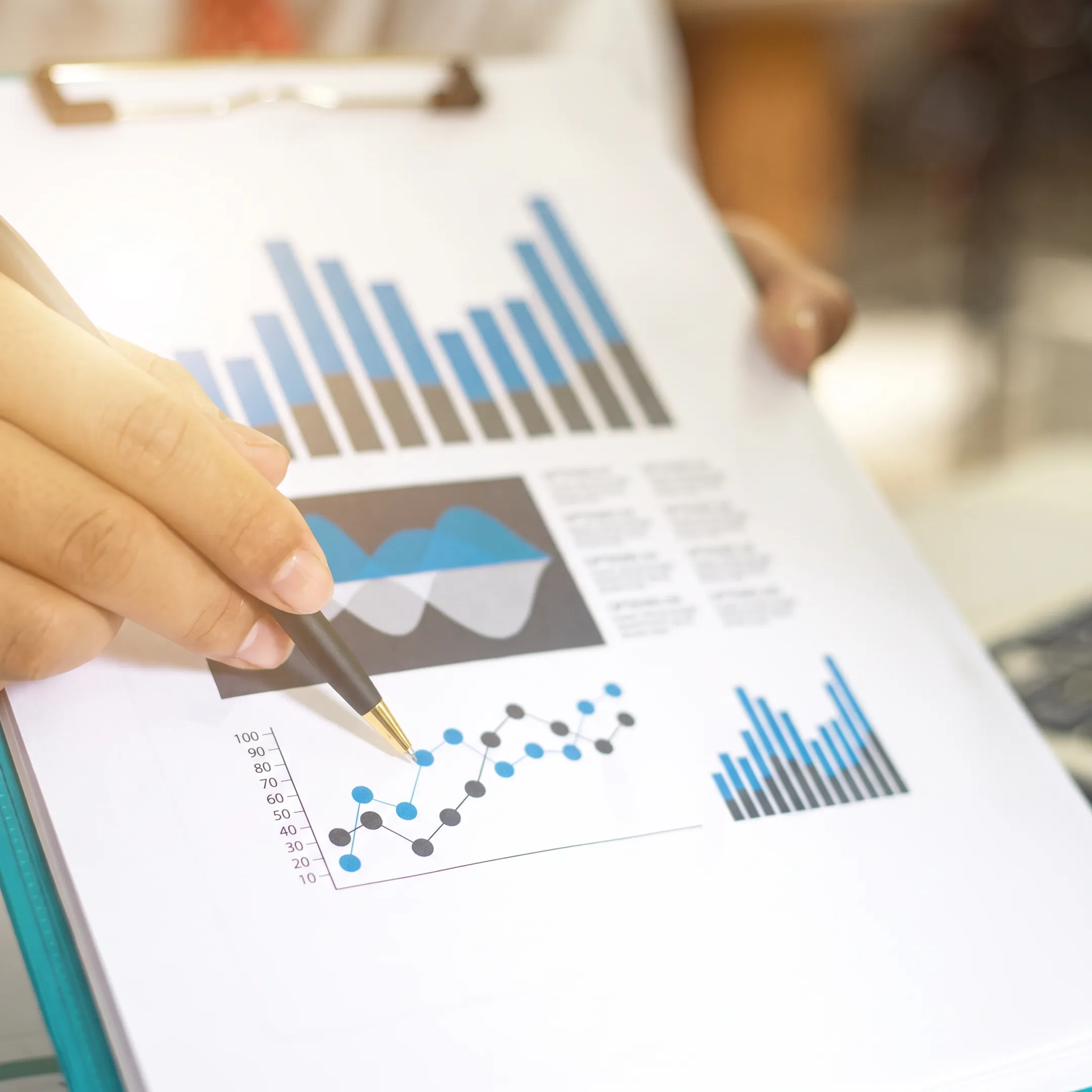 Financial professional reviewing contractor bookkeeping reports