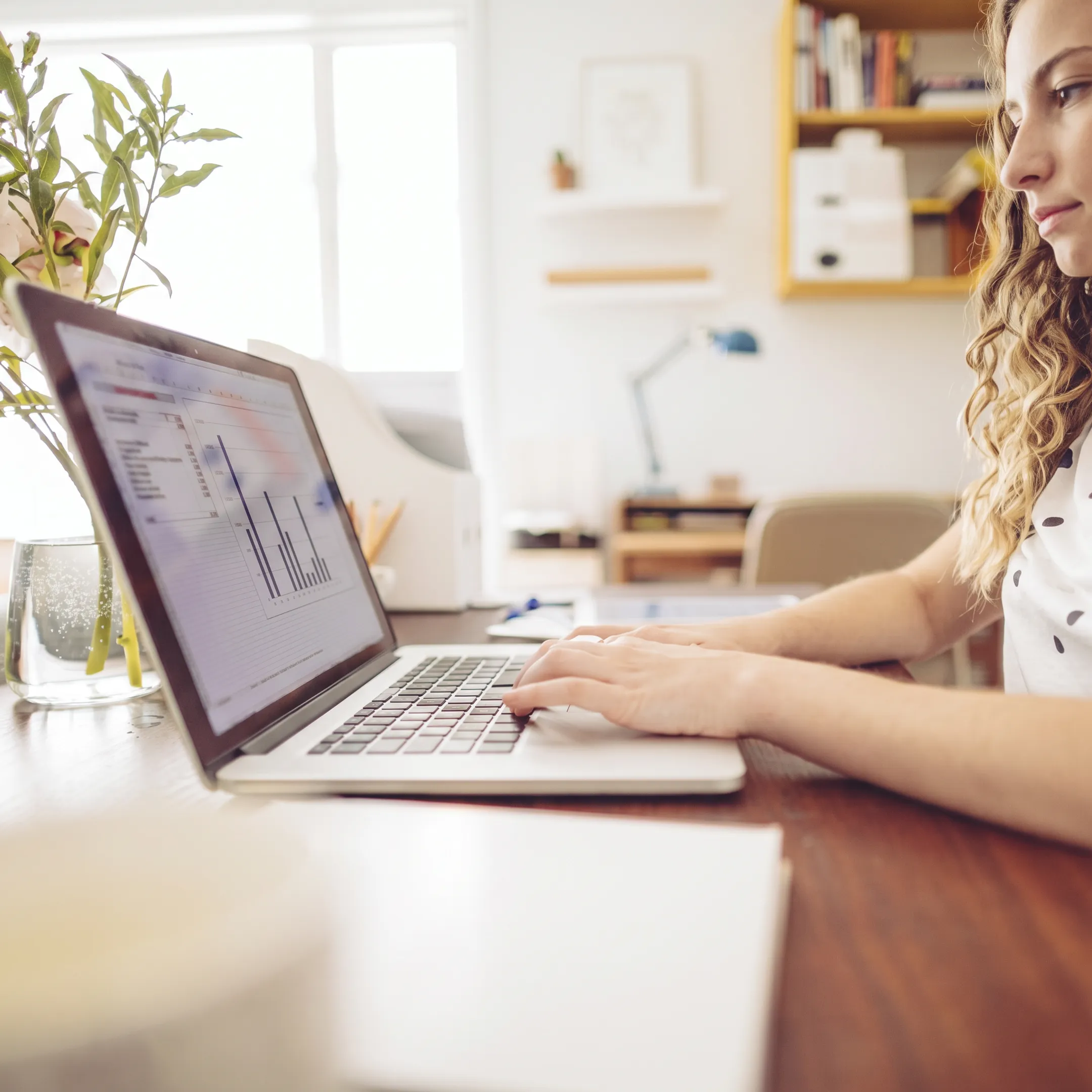 Financial professional organizing QuickBooks records and accounting documents