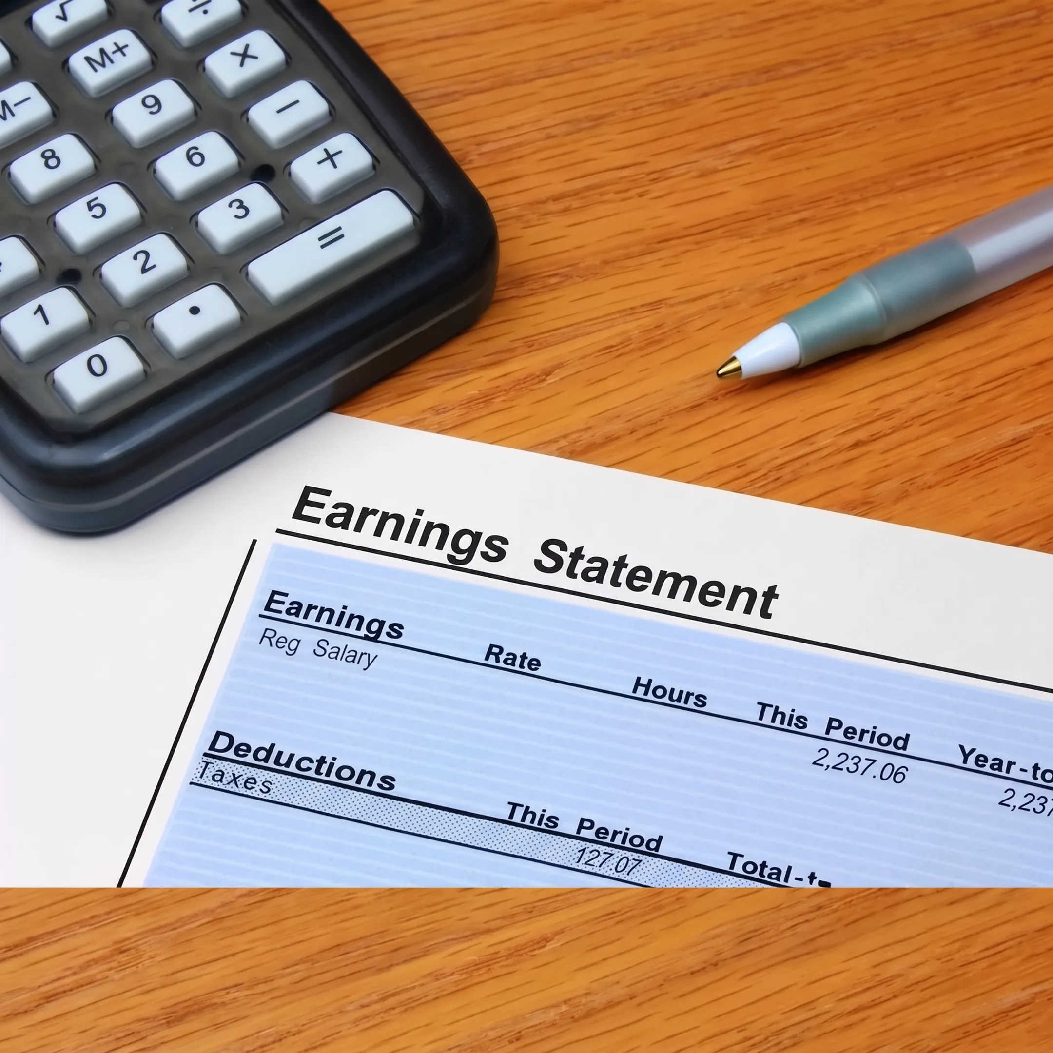 Business advisor organizing financial and tax documents for reinstatement support