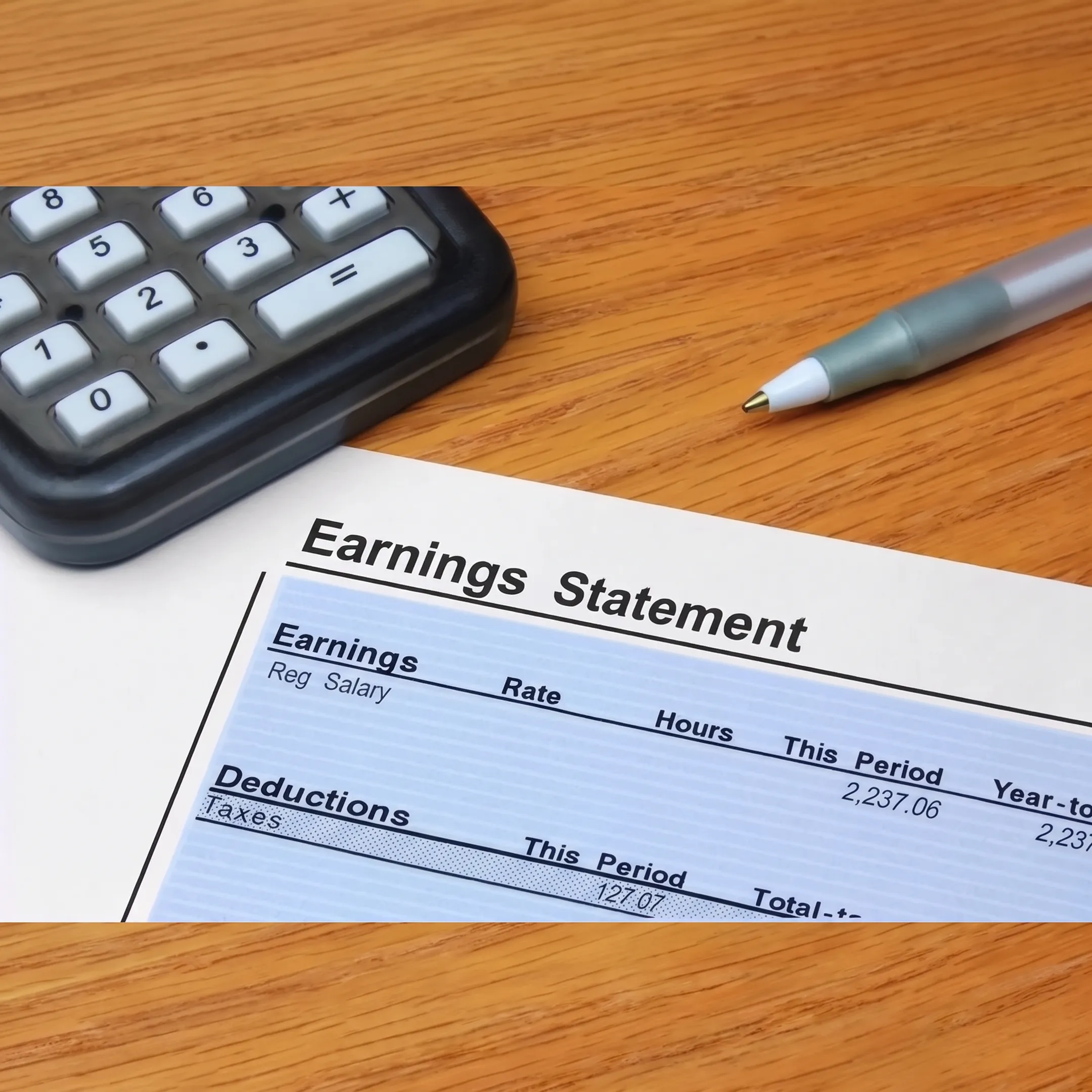 Financial advisor discussing manufacturing business accounting records