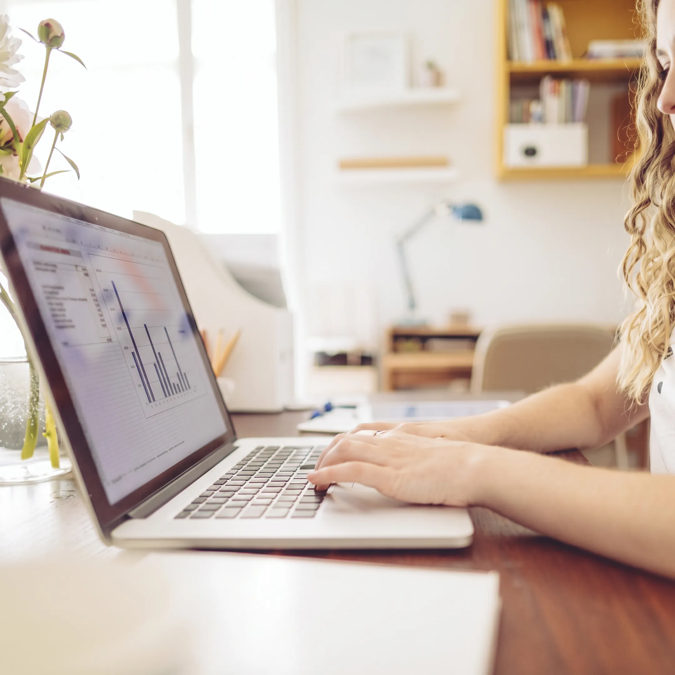 Business owner reviewing clear financial reports with an accountant