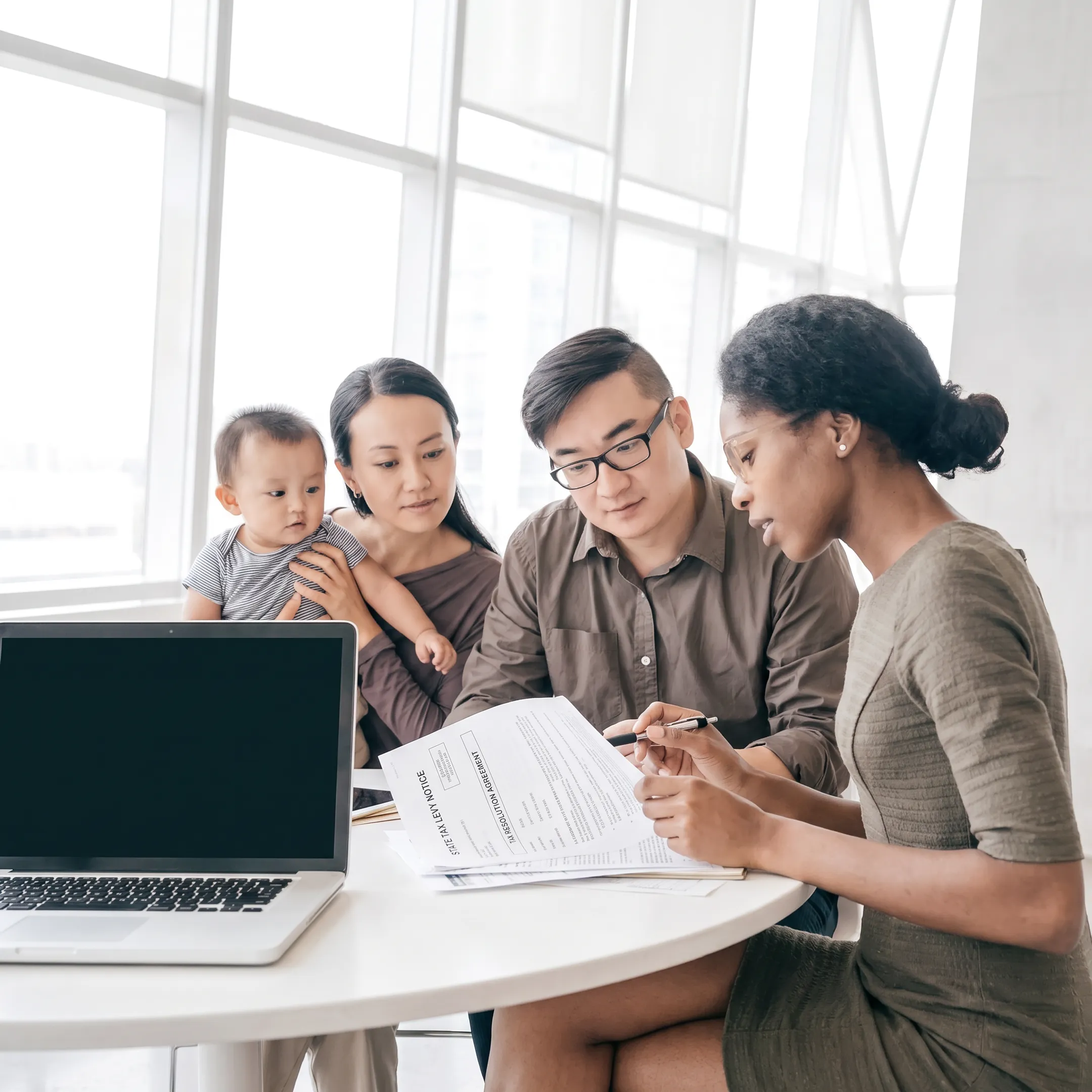Advisor explaining state tax levy documents to a client