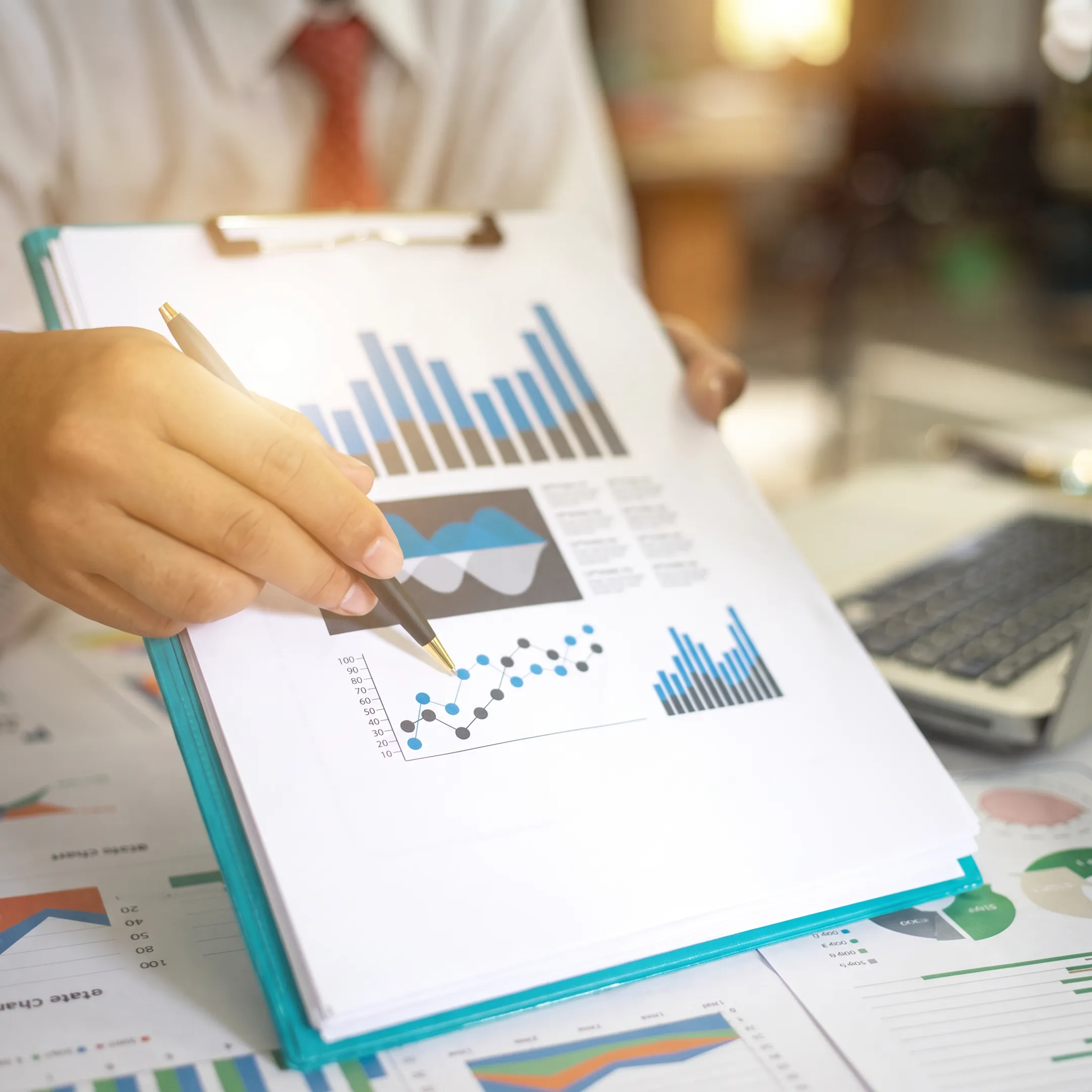 Financial advisor explaining a business budget to an owner