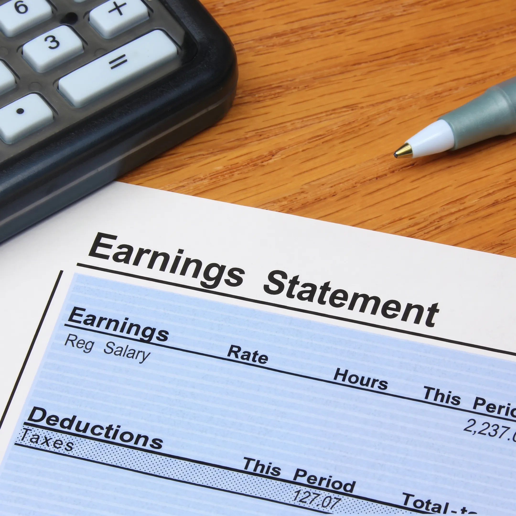 Professional comparing credit card transactions with accounting records