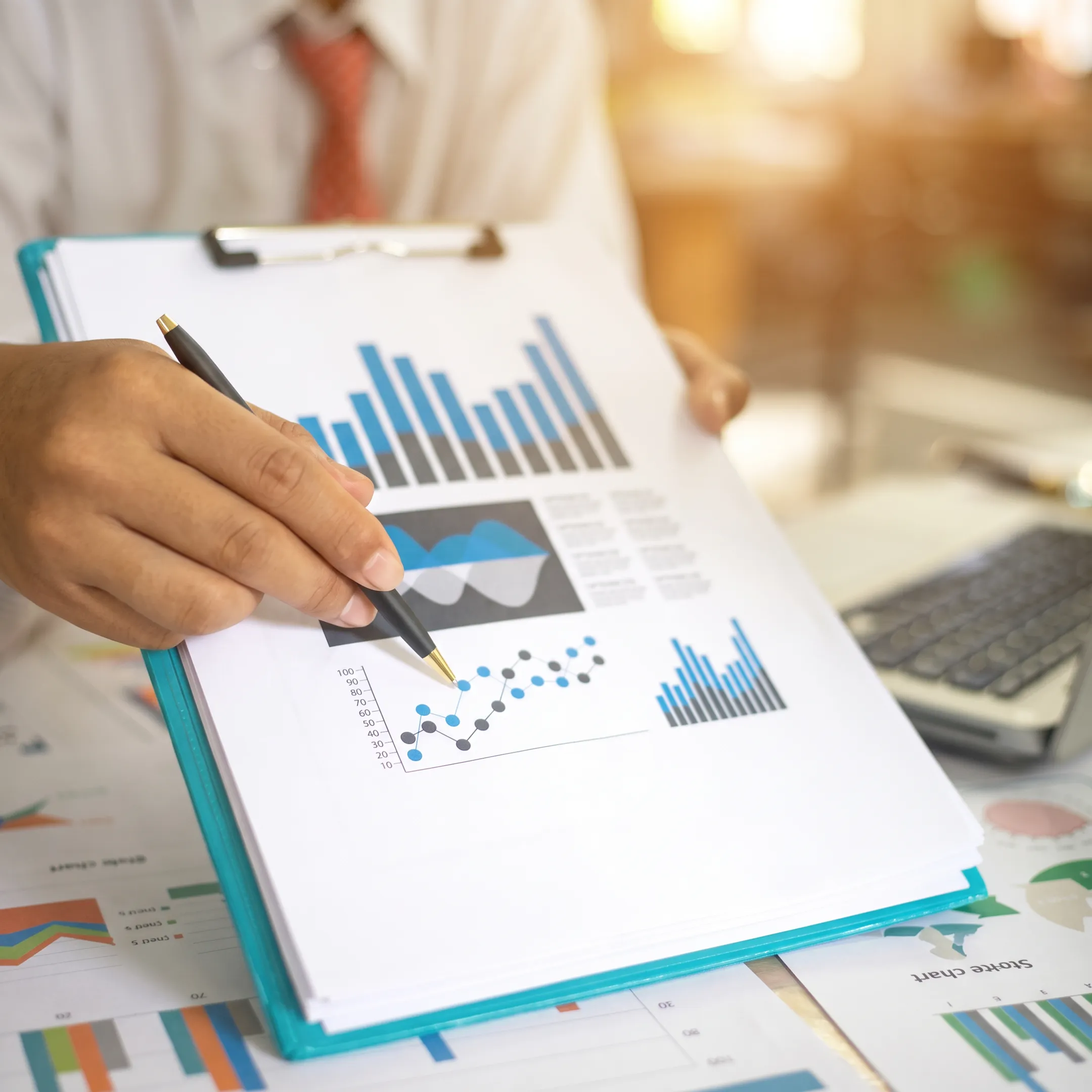 Advisor explaining business financial performance to company owner