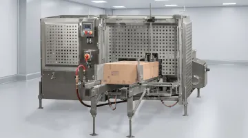 Stainless steel case erector with washdown construction in food manufacturing facility