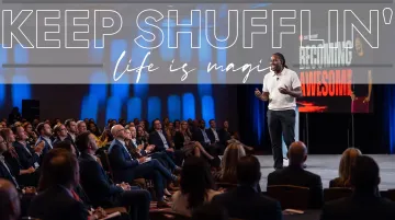 Former heavyweight boxing champion addressing corporate keynote audience