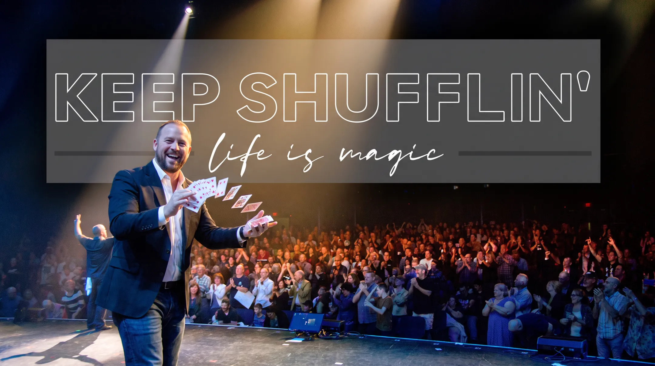 Jon Dorenbos performing magic during corporate keynote speech on stage
