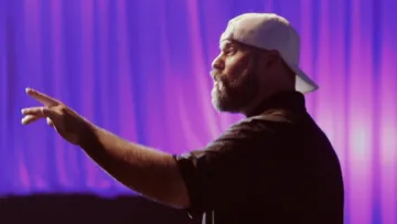 Jon Dorenbos performing live magic during corporate keynote address