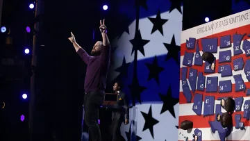 Jon Dorenbos performing card magic keynote on stage at corporate event