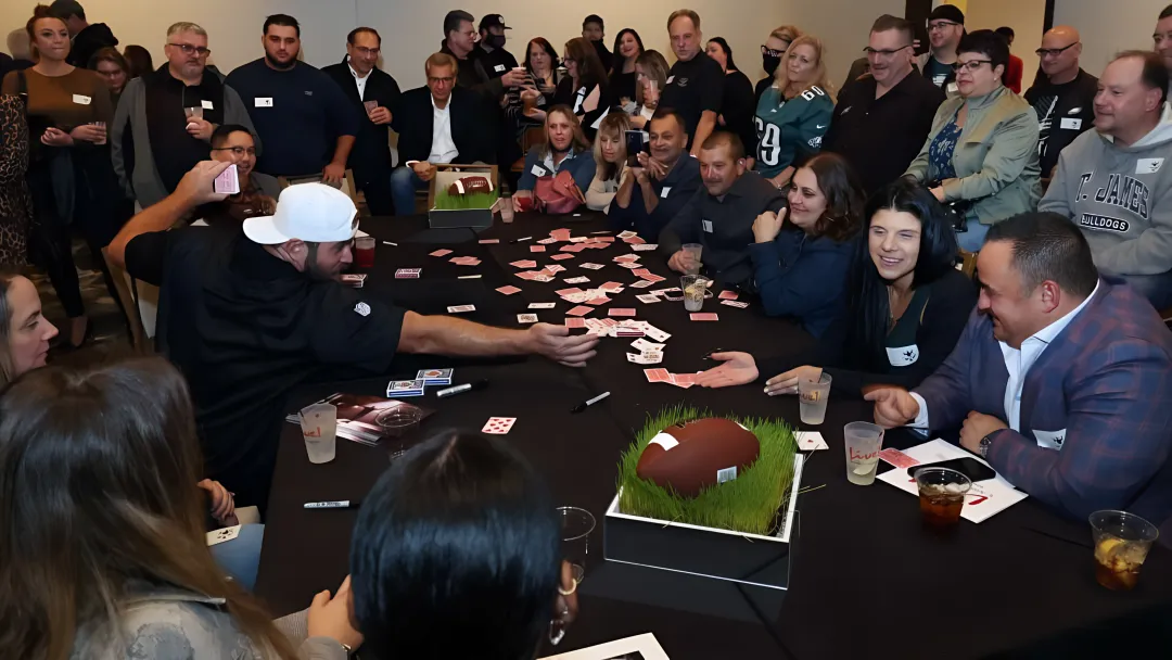 Jon Dorenbos performing magic during a live corporate keynote presentation